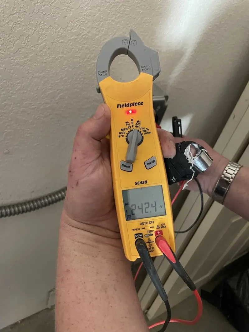 Voltage testing with clamp meter during Hot Tub / Pool Electrical Wiring in Rosewood Heights